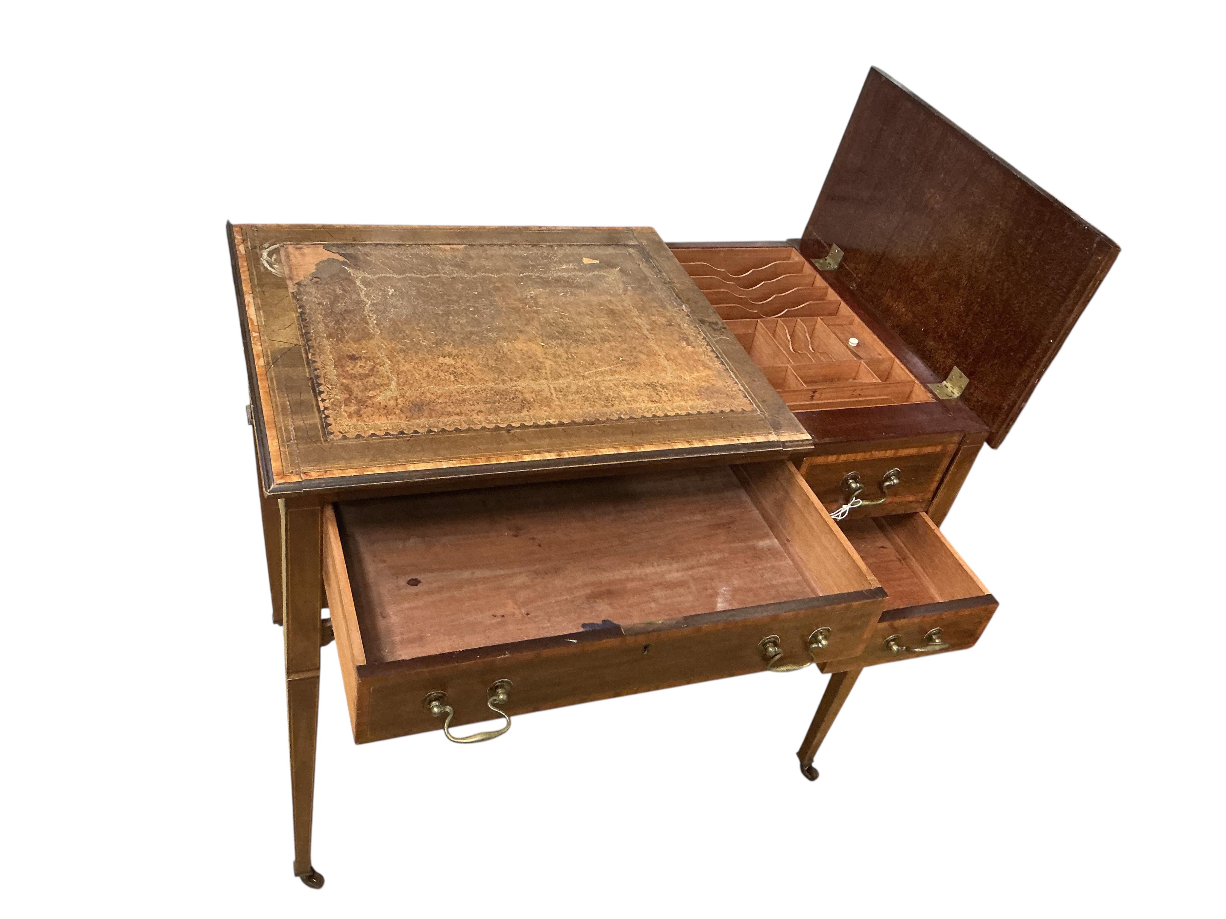 An Edwardian satinwood banded mahogany kneehole writing table, width 85cm, depth 50cm, height 74cm